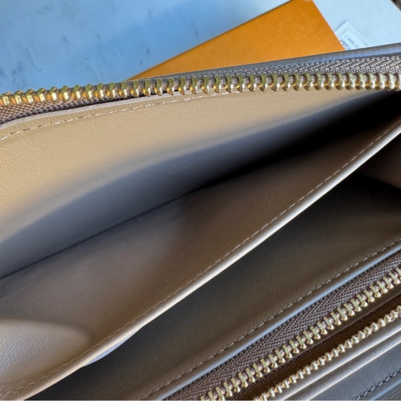 Louis Vuitton Coussin Empreinte Monogram Leather Zippy Wallet - Picture 12 of 16